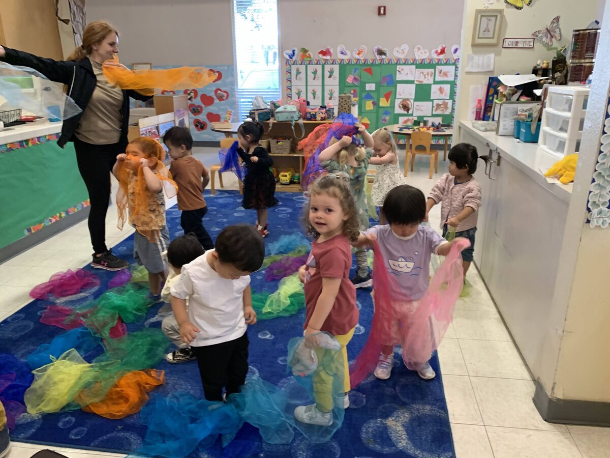 Children enjoying creative movement and dance class together
