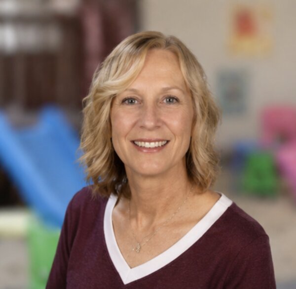 Portrait of UPNS teacher Brigitte Peistrup in the classroom environment