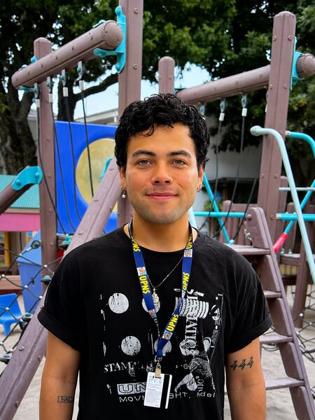 Portrait of UPNS teacher Kobe Kubes in the classroom environment