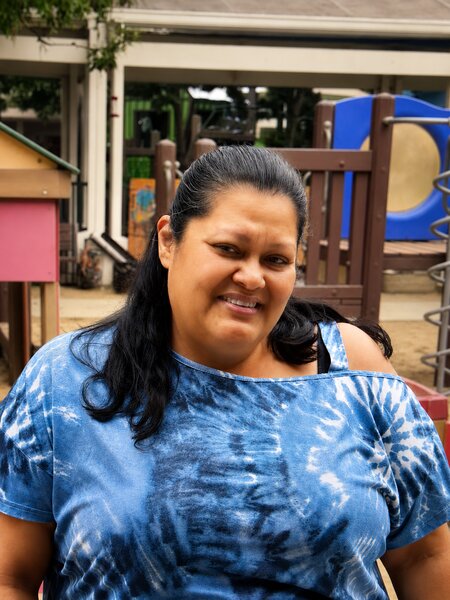 Portrait of UPNS teacher Maria Maldonado in the classroom environment